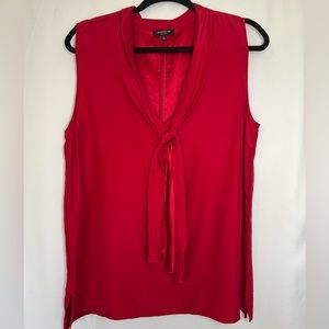 Large sleeveless red Lafayette 148 blouse .